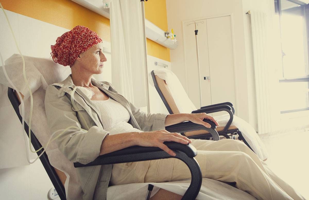 middle aged woman undergoing chemotherapy treatments