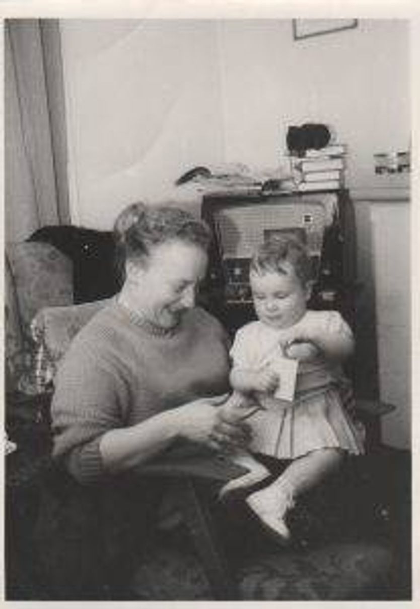 A young Marijke with her grandmother