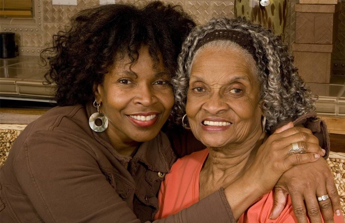 Mother and daughter embracing