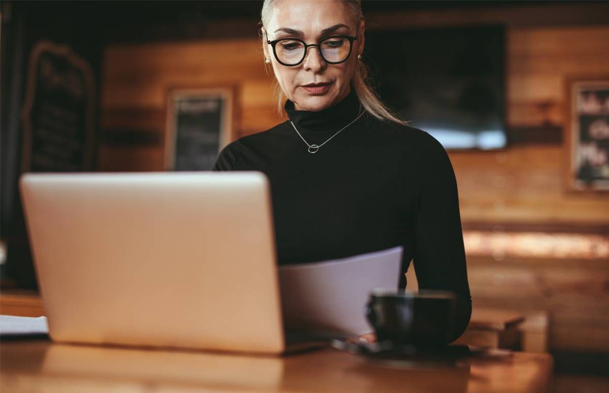 Woman reviewing finances or other type of retirement planning