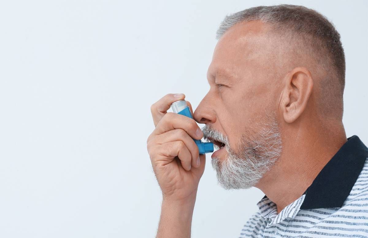 man with inhaler