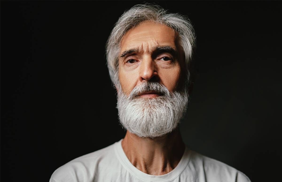 Portrait shot of man looking directly into camera.