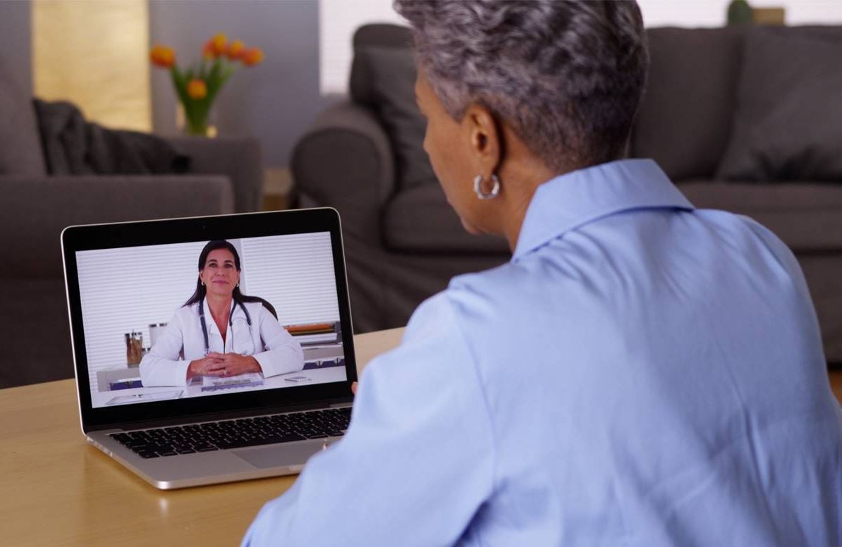 Patient virtually connecting with doctor.