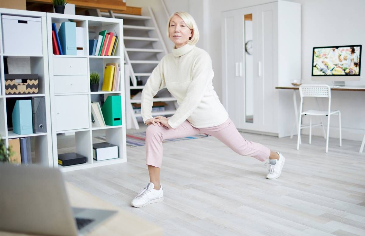 woman performing physical therapy exercises with virtual guidance