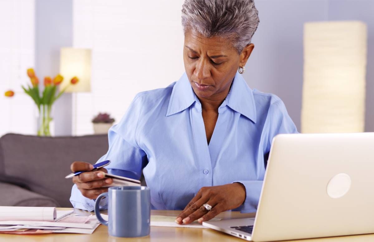 Woman paying bills