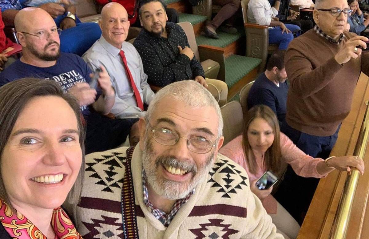 Hugo Sapién (center) at the Texas State Capitol in Austin on HIV Advocacy Day with fellow HIV advocates. Sapién, 62, is a long-term survivor of HIV.