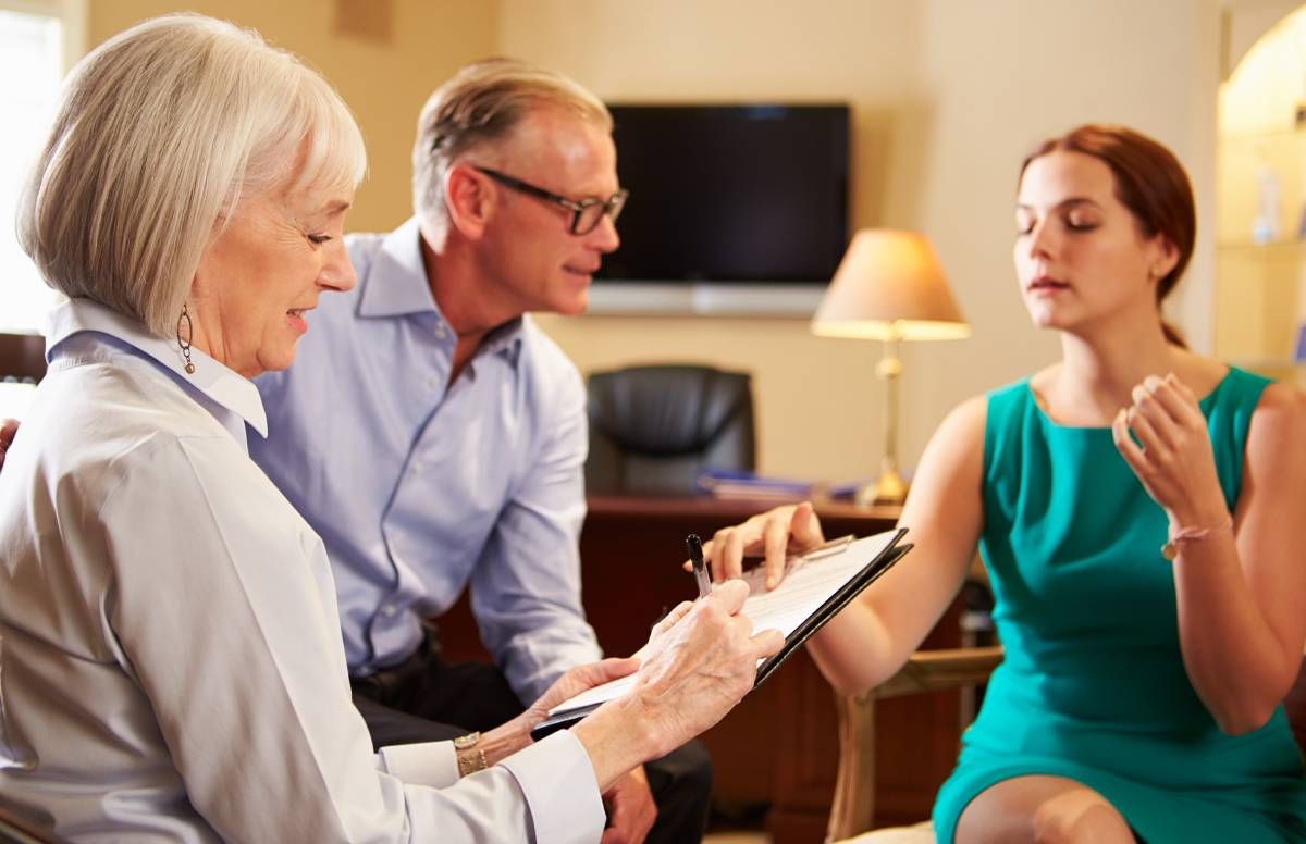 Couple working with financial planner