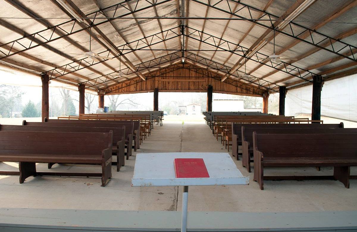 empty pews at outdoor church service