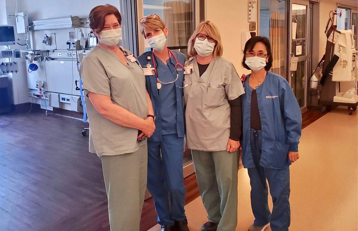 4 nurses with masks
