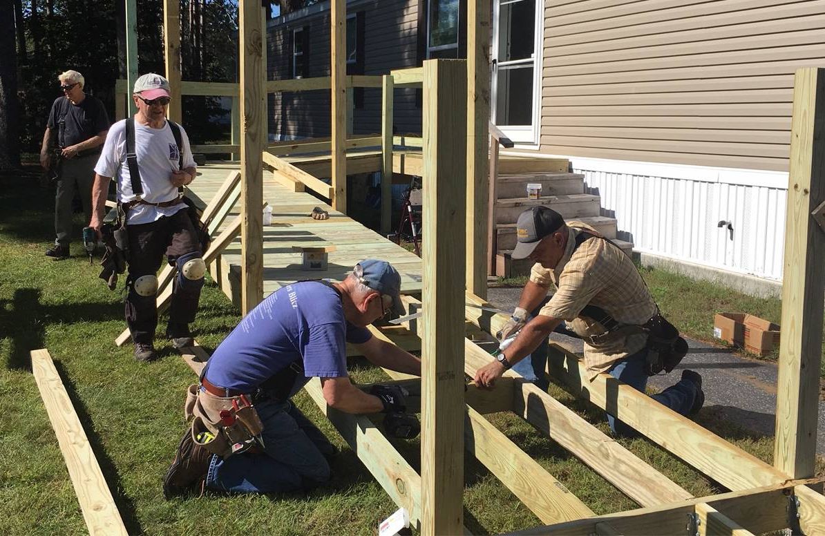 Volunteers building ramp