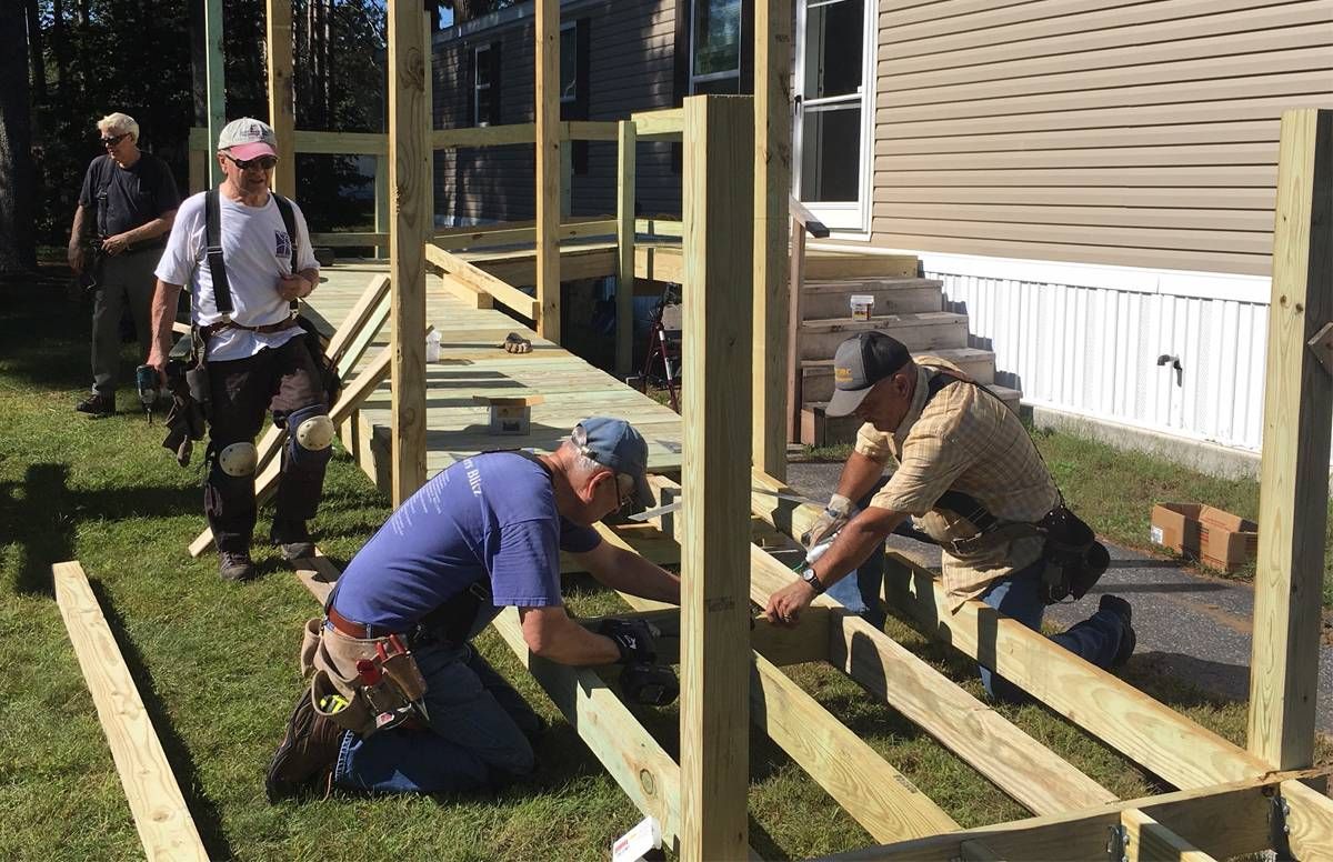 Volunteers building ramp