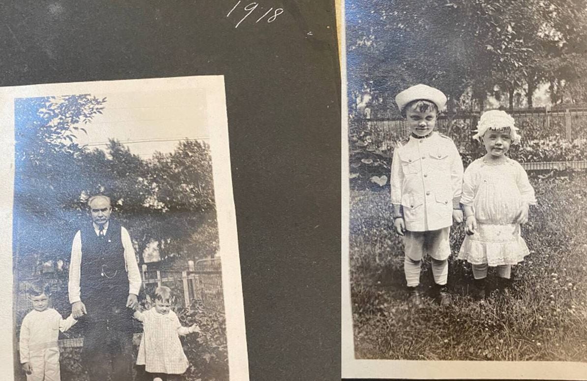 Old-time photo album with family photos of Kelly's father as a child