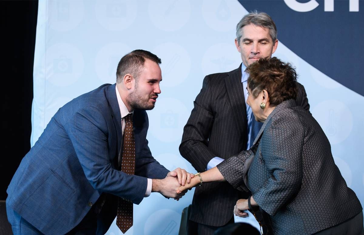 Jason Resendez shaking hands with Congresswoman Donna Shalala (D-FL)