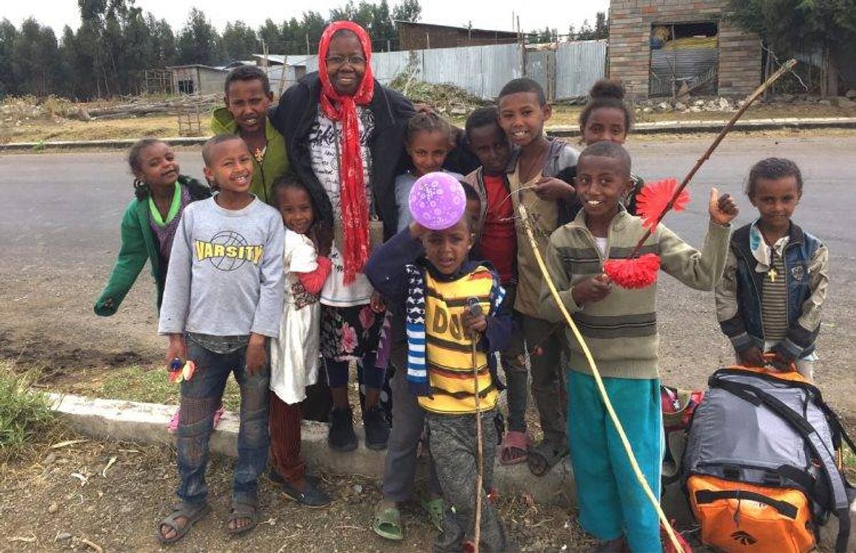 Karen Jean Hunt gathers with some of her students in Kotu, Ethiopia