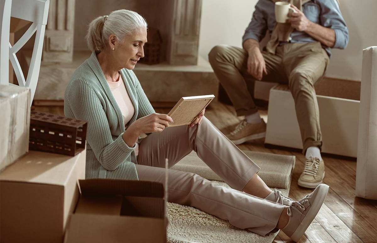 Woman looking at boxes