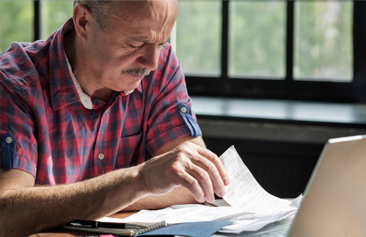 man doing his finances