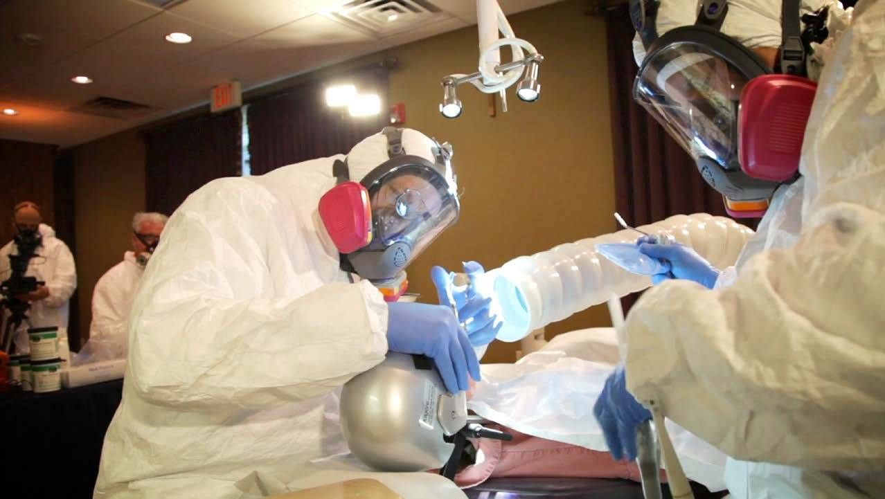 The dentists/dental staff wear a properly sealed mask rated to capture mercury or provide air/oxygen, a protective gown, face shield and hair net, and non-latex nitrile gloves, Next Avenue, dental hygiene