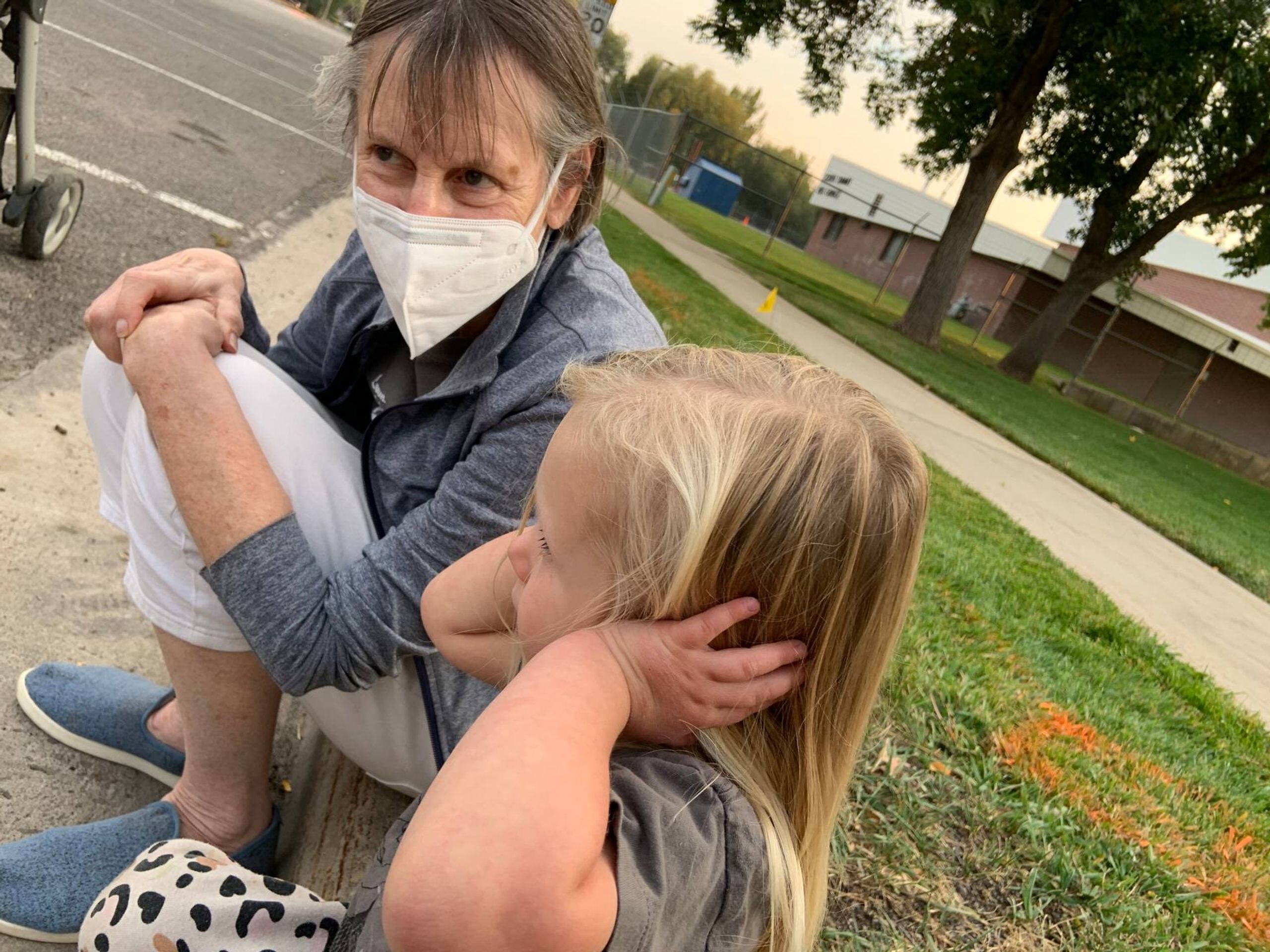 Jolene and her grandma watching bulldozer, Next Avenue,  grandchildren