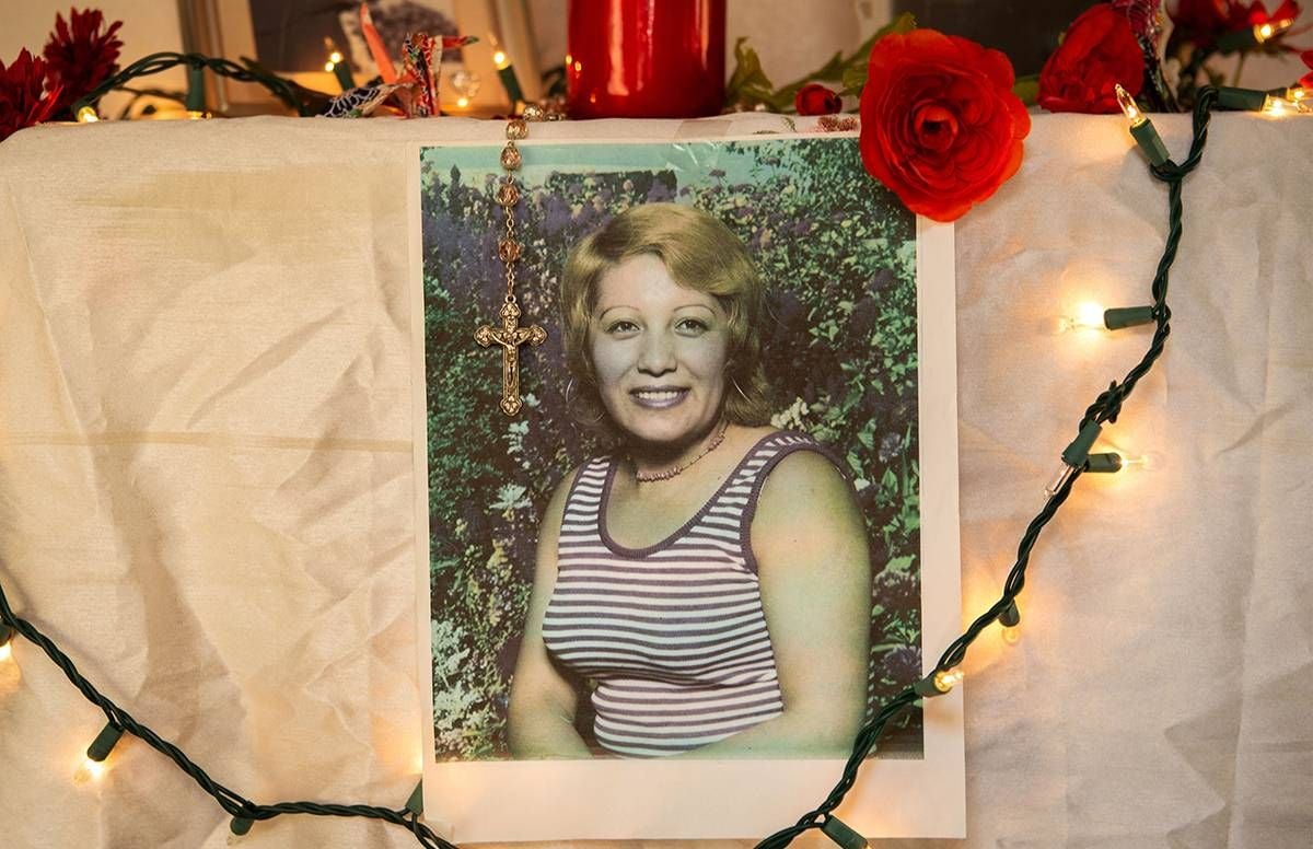 A photo of Maria Elena Nuñez displayed on an alter in her daughter's home