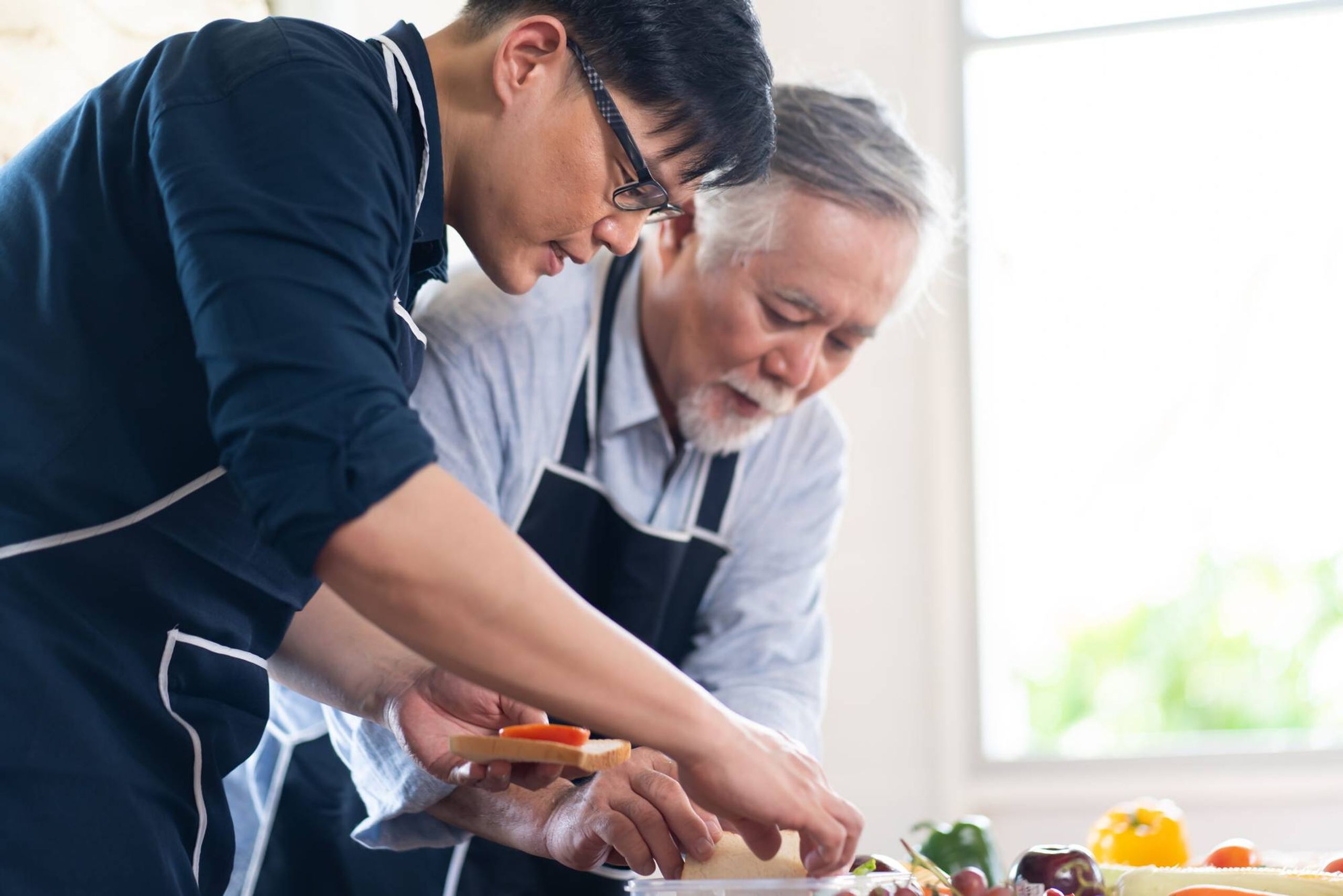 Father and son in kitchen, Cooking up calm, Next Avenue