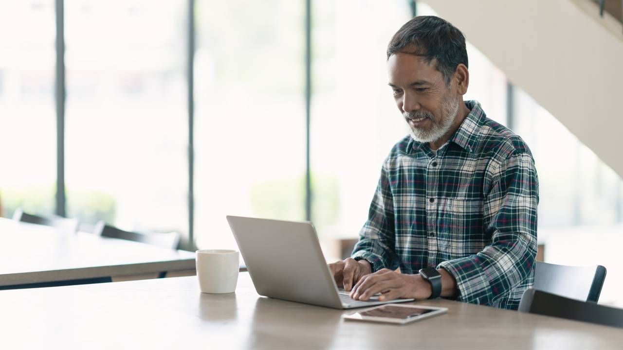 Man at computer, digital estate plan, Next Avenue