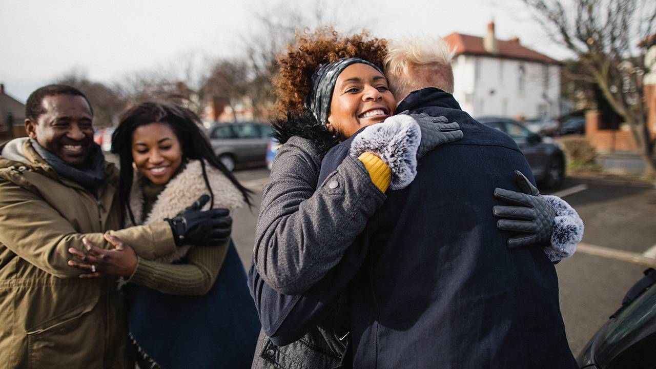 Parents greeting daughter and significant other, child, relationships, Next Avenue