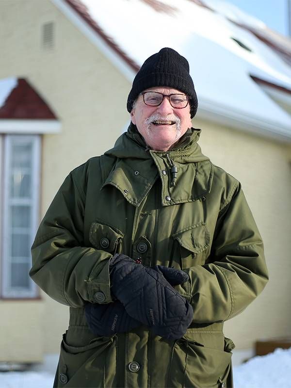 David Koulack standing in front of his home smiling, mild cognitive impairment, Next Avenue