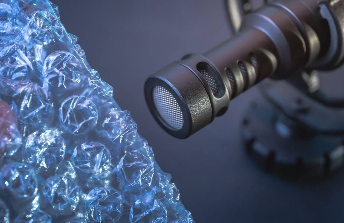 ASMR sounds, bubble wrap popping into a microphone