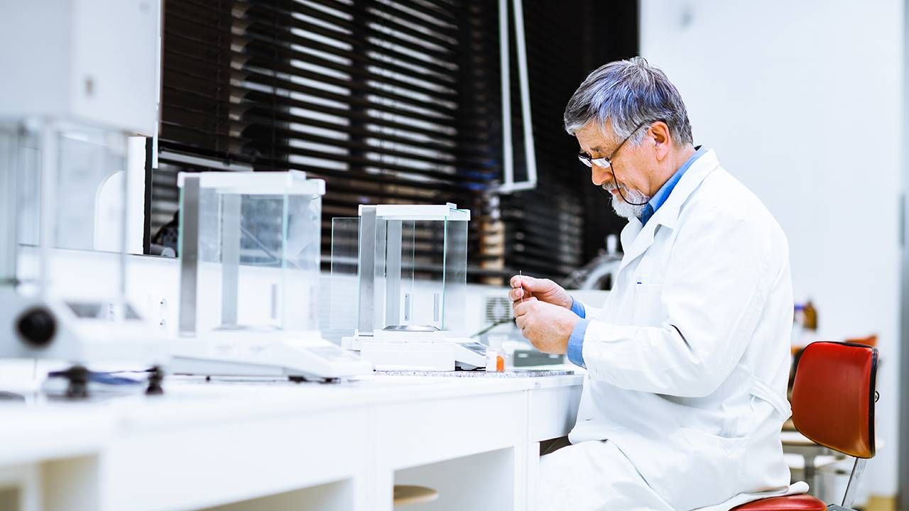 Scientist conducting research in a laboratory, read health news like a scientist