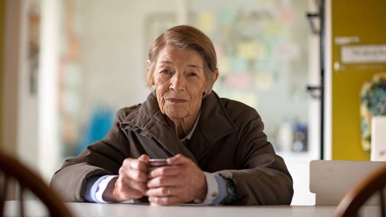 Still from PBS film 'Elizabeth is Missing' older woman sitting down holding mug, films, dementia, Next Avenue