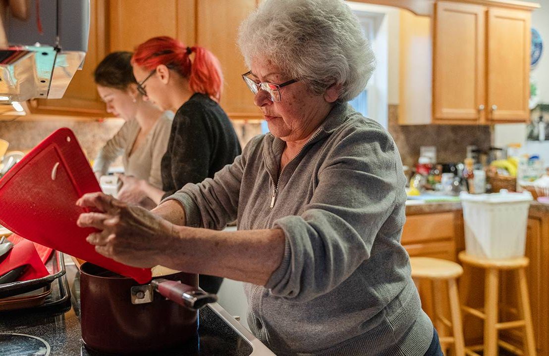 multigenerational family cooking together, ageism, Next Avenue