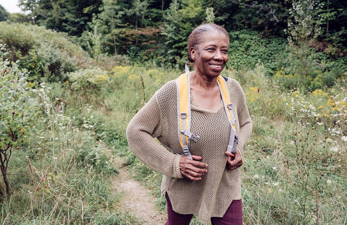 woman hiking in nature, heart health, women, Next Avenue