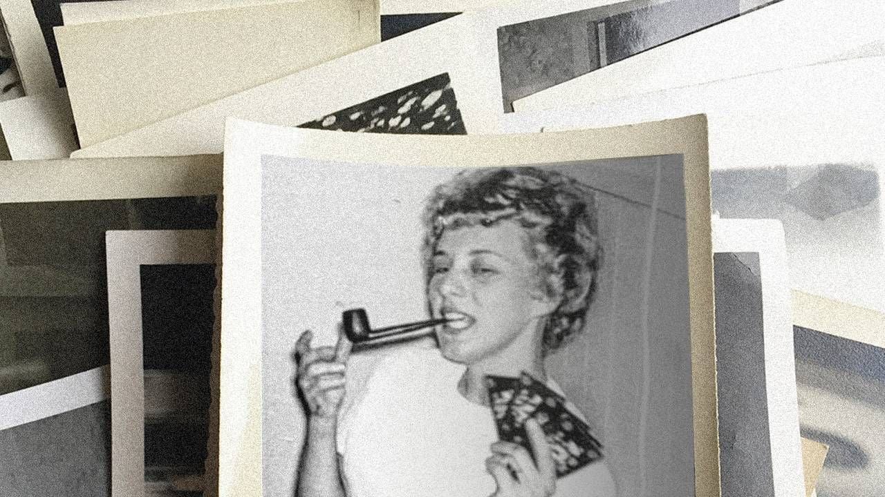 Old photo of a woman smoking a pipe playing cards, writing obituary, Next Avenue