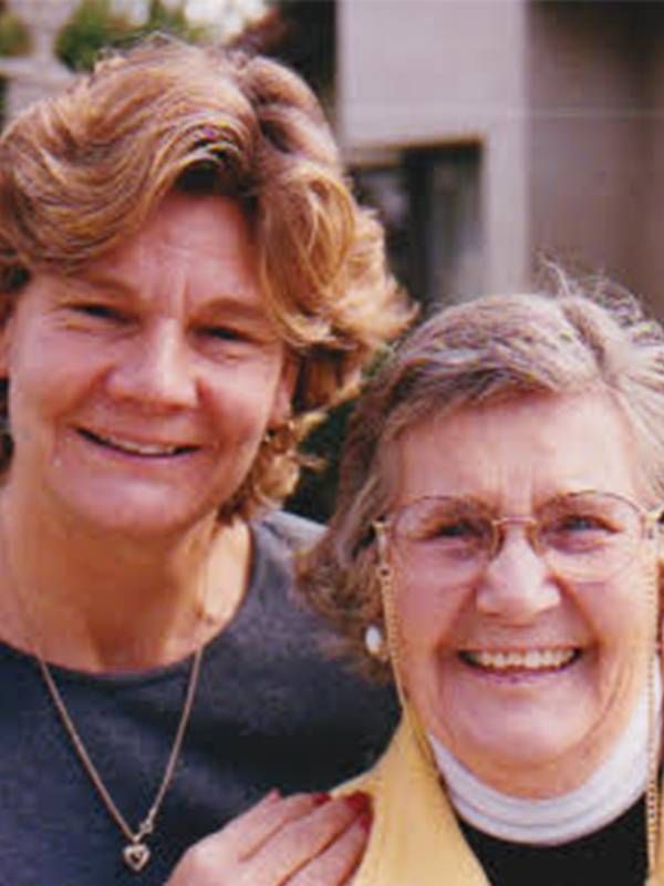 A woman and her mother standing outside, deaf, caregiver, Next Avenue