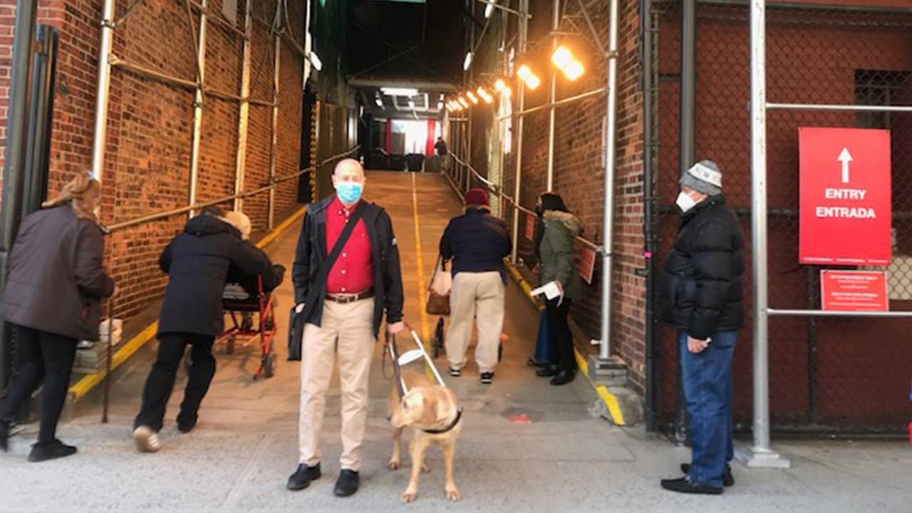 Author with his guide dog after getting COVID-19 vaccine, Next Avenue