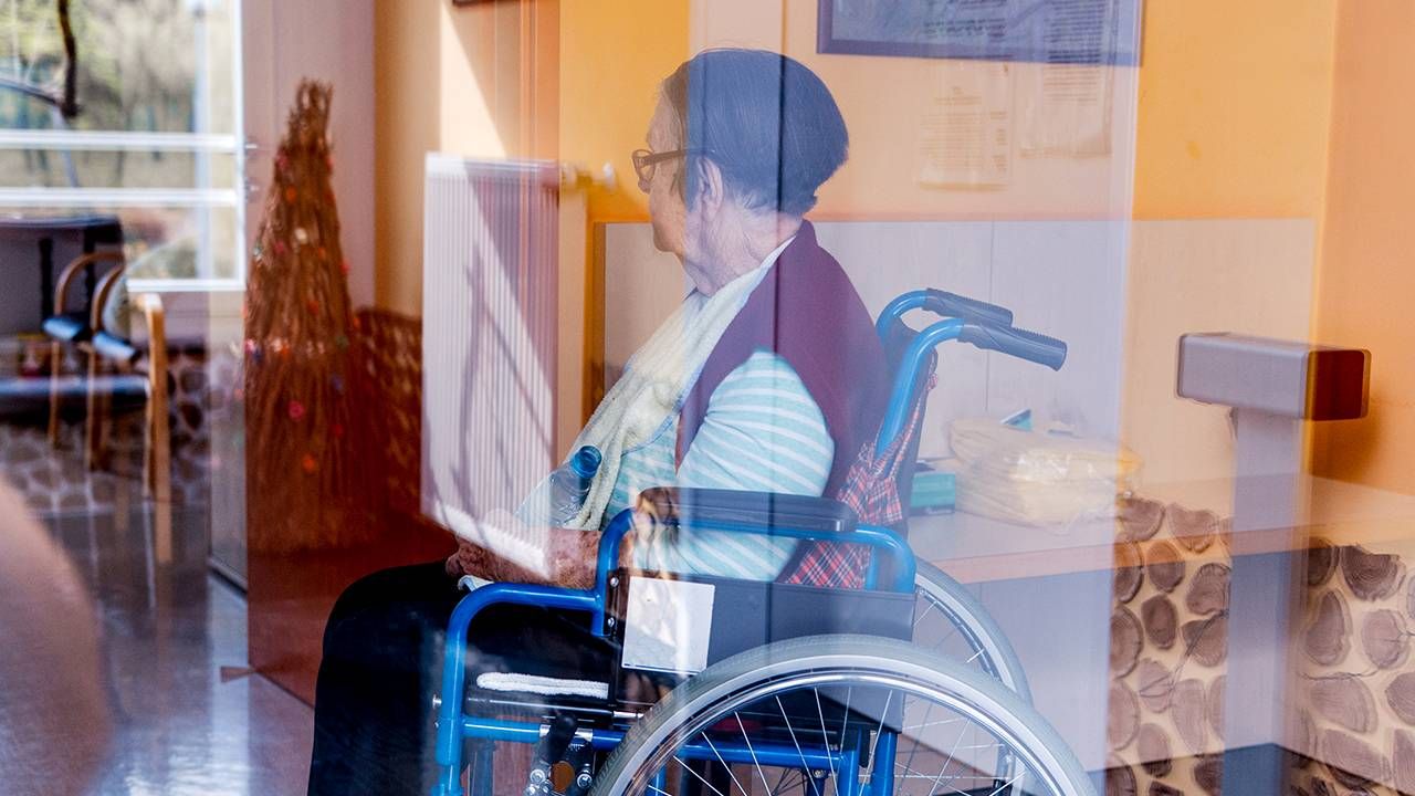 Nursing home, Next Avenue, Older woman using wheelchair in nursing home, Next Avenue