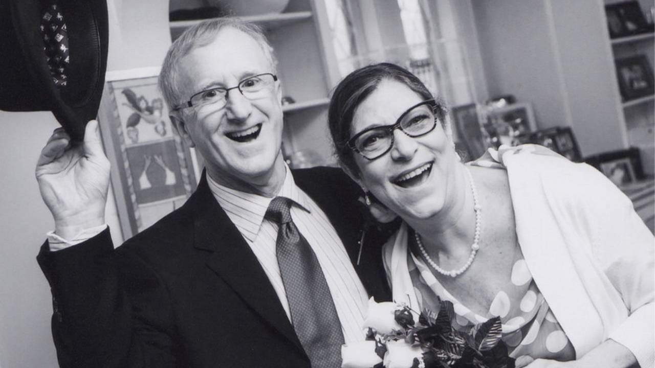 Black and white wedding photo of a smiling, healthy couple, caregiver, caregiving, Next Avenue