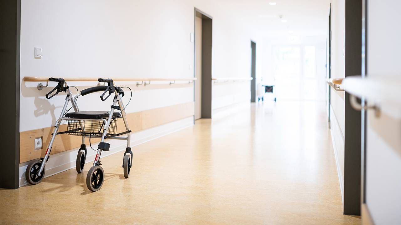 One walker waiting in the hallway of an assisted living facility. Long-term care,Next Avenue