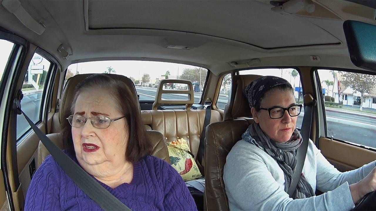 A caregiver and her mother driving in a car. Next Avenue, It's not a burden, caregiving