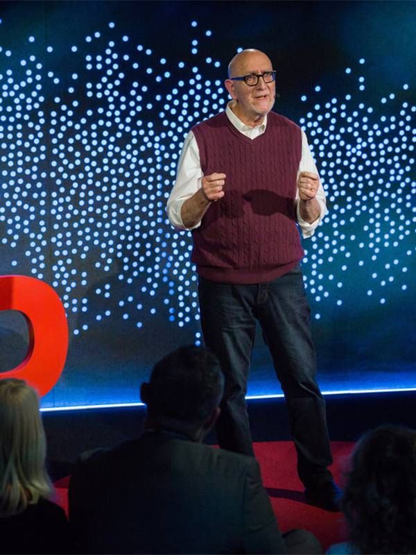 An older man speaking on the TED stage. Entrepreneurs, Next Avenue