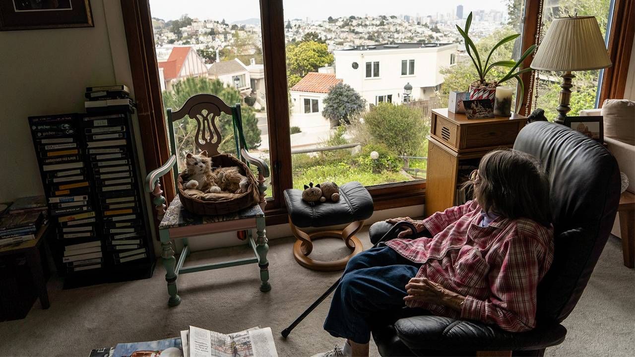 LGBTQ activist looking out the window of her home.  Lyon Martin house, lesbian activists,Phyllis Lyon, Del Martin, Next Avenue