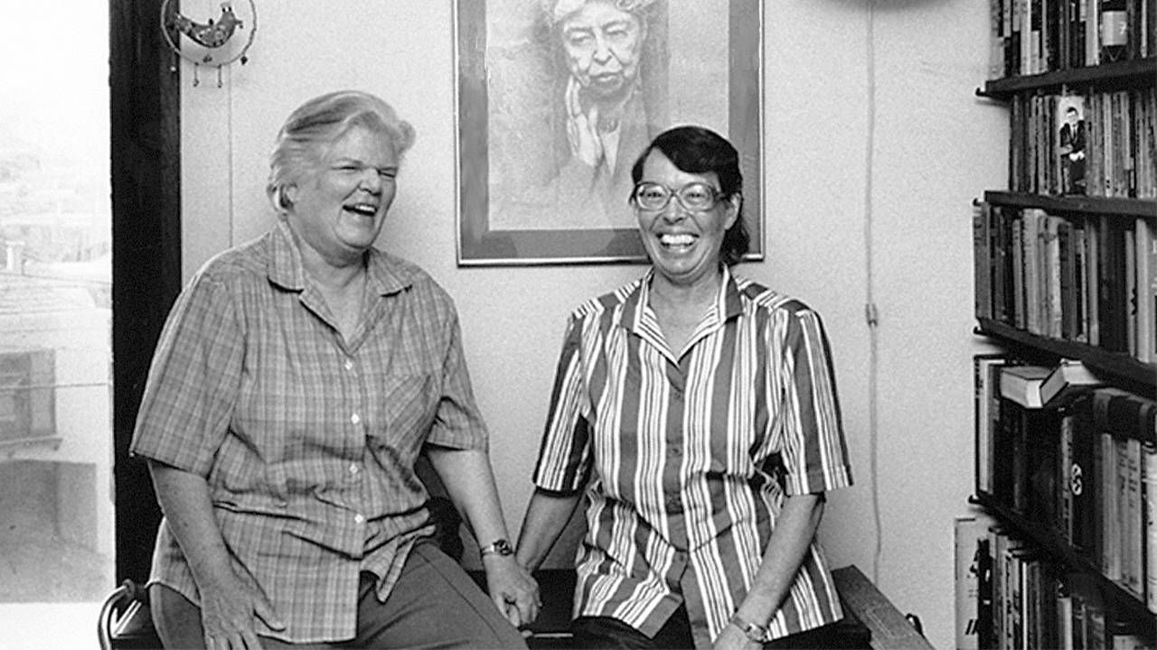 Black and white photo of the two LGBTQ activists in their home. Lyon Martin house, lesbian activists, Phyllis Lyon, Del Martin, Next Avenue