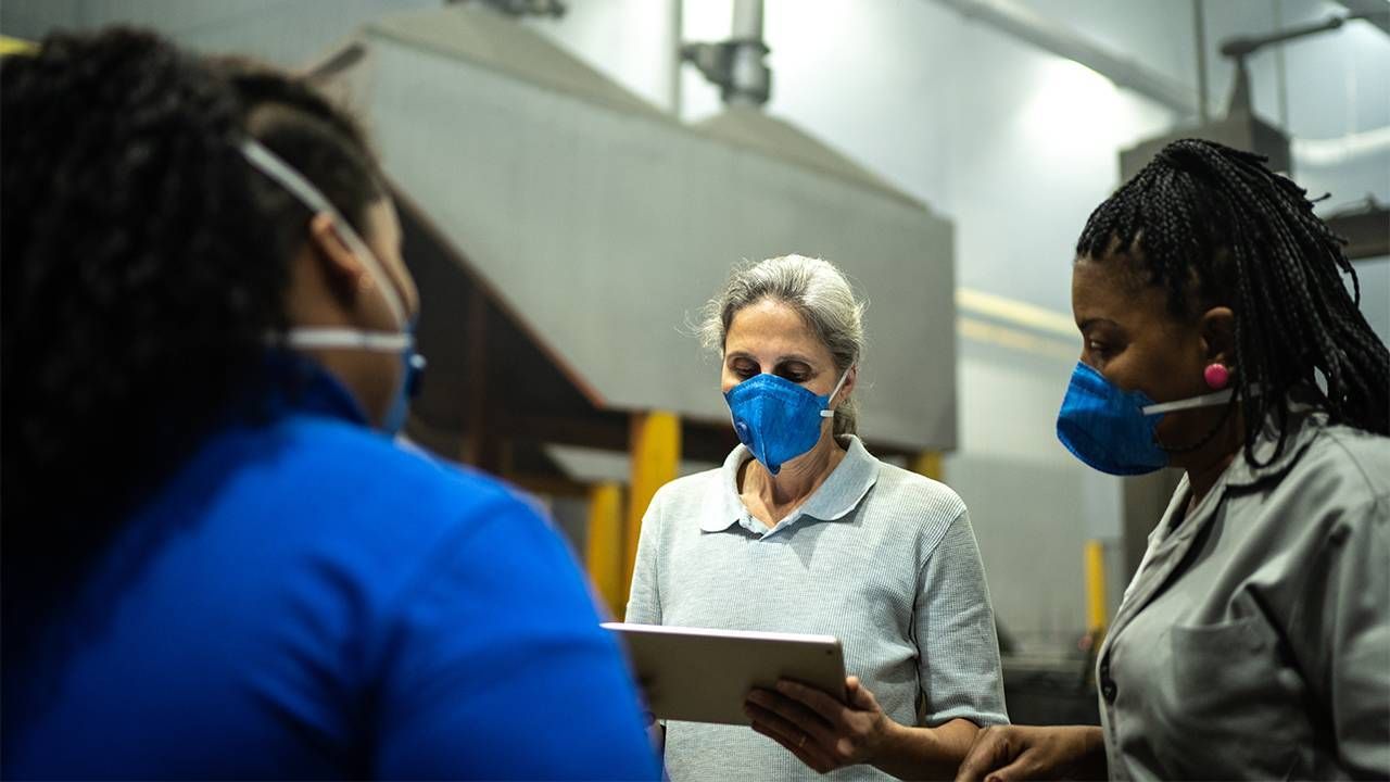 a group of workers varying in age. ageism at work, workplace, Next Avenue