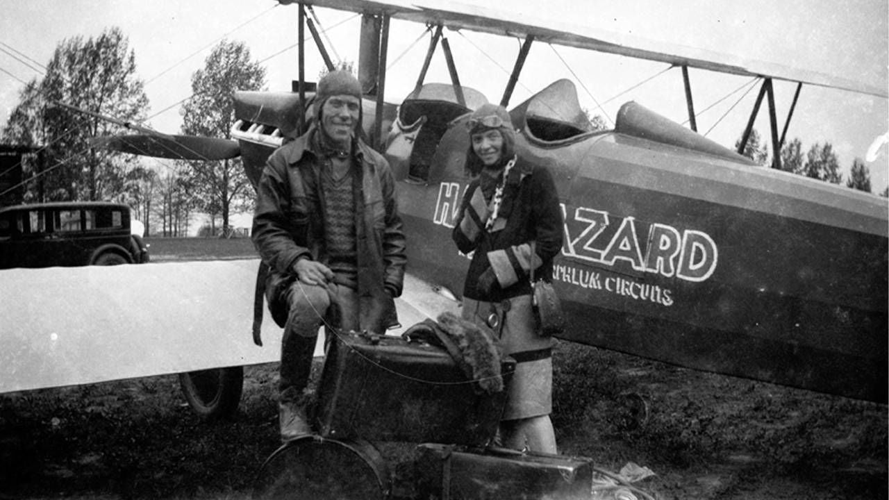 An old photo of the author's great-grandmother next to an old airplane. Next Avenue, circus