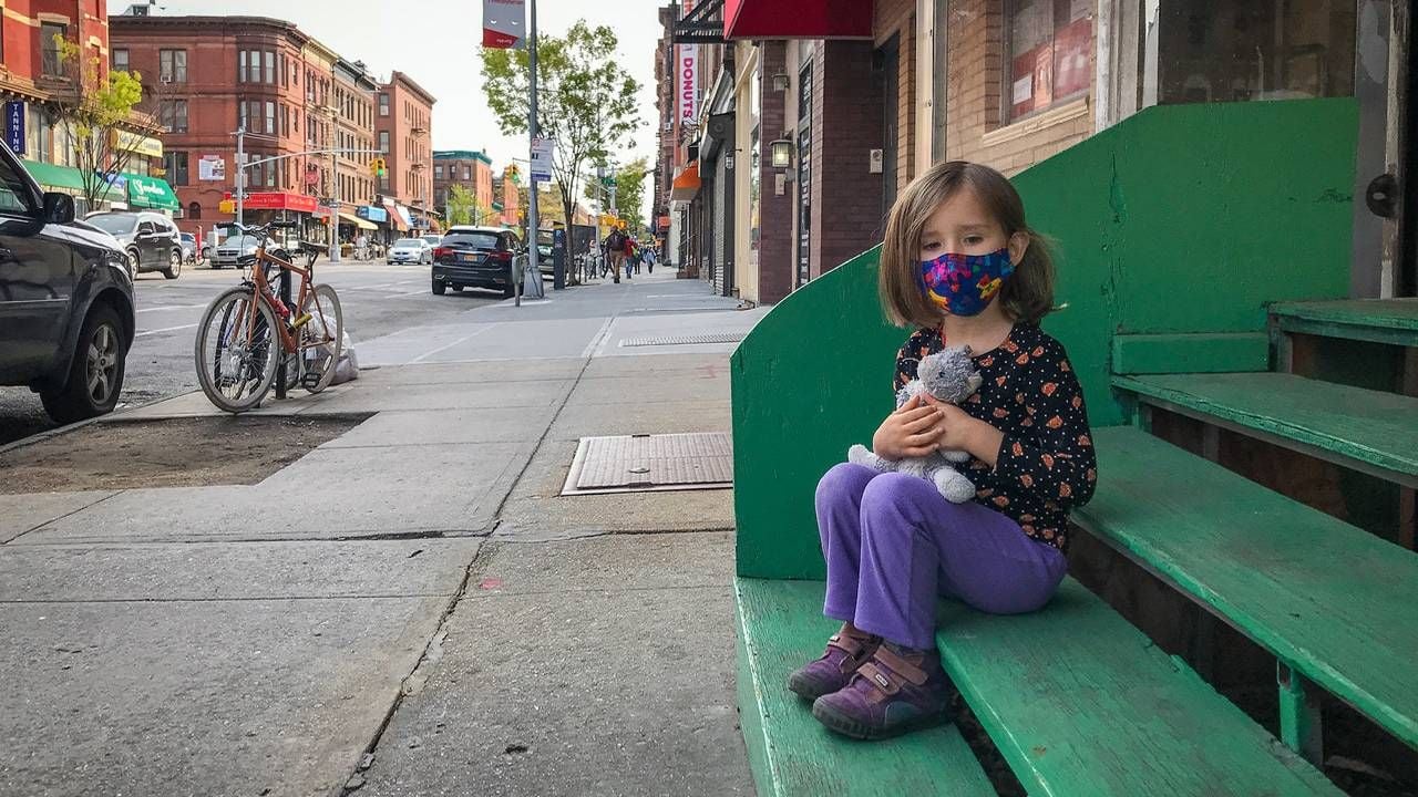 The photographer's daughter sitting on steps in NYC. photography, photographer, Next Avenue