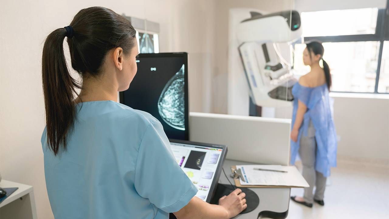 A woman getting a mammogram. Next Avenue, Metastatic Breast Cancer