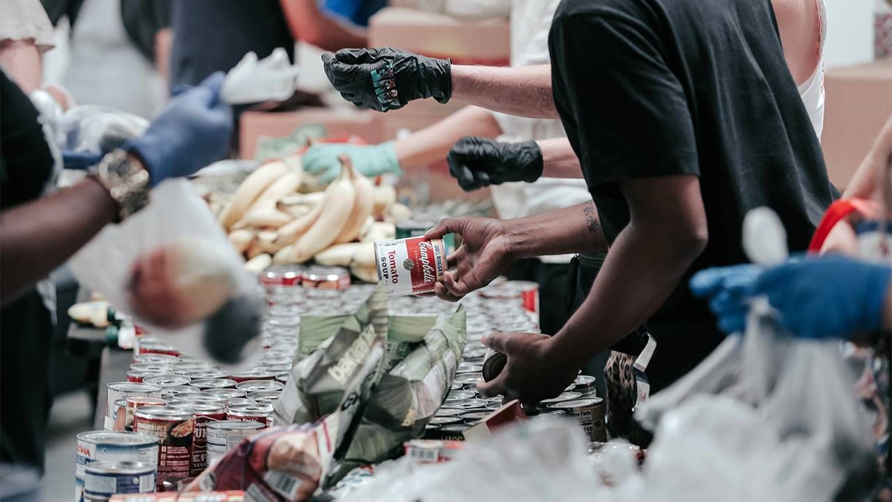 A group of community volunteers at a soup kitchen. Next Avenue, elder corps, volunteering