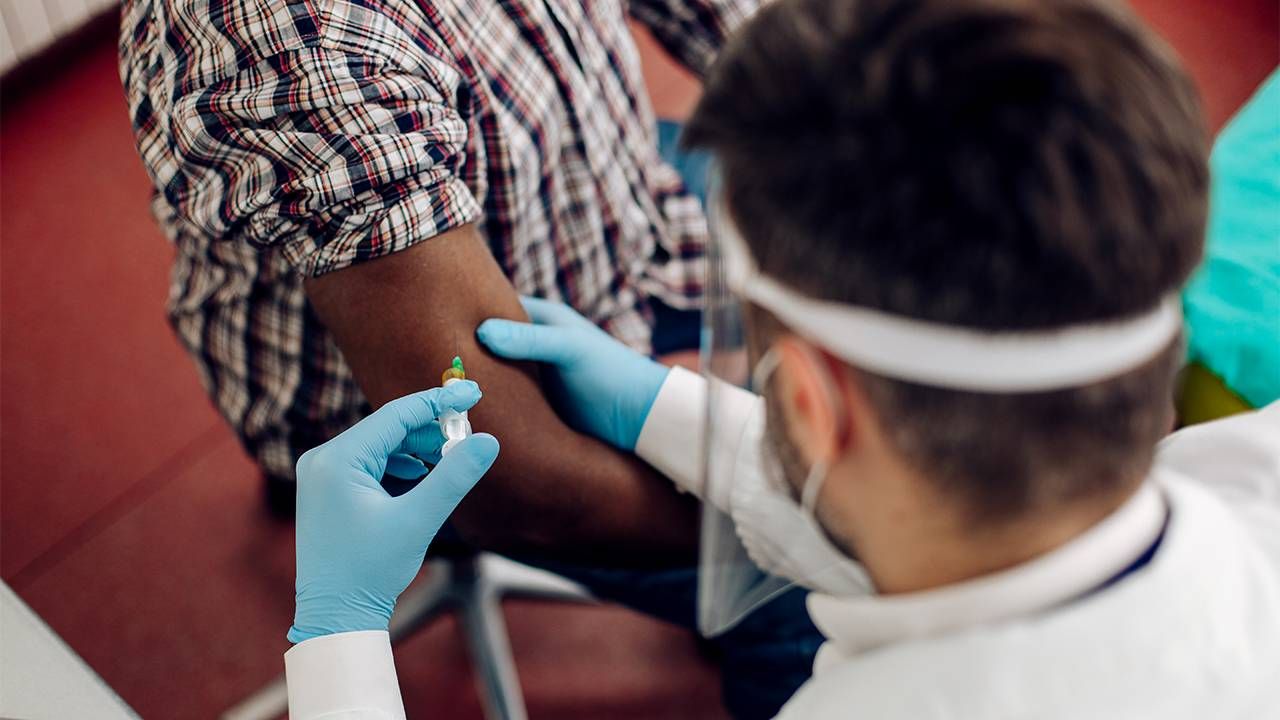 A man getting a shingles vaccine shot. Next Avenue