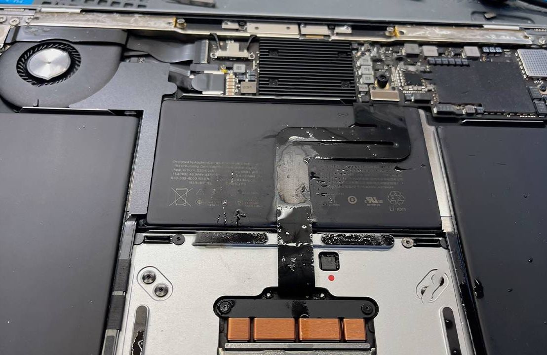 The inside of a wet laptop. Next Avenue, computer