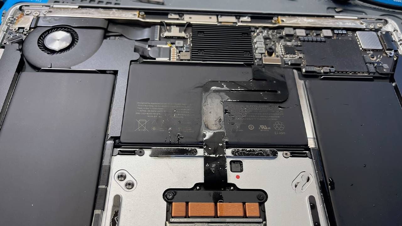The inside of a wet laptop. Next Avenue, computer